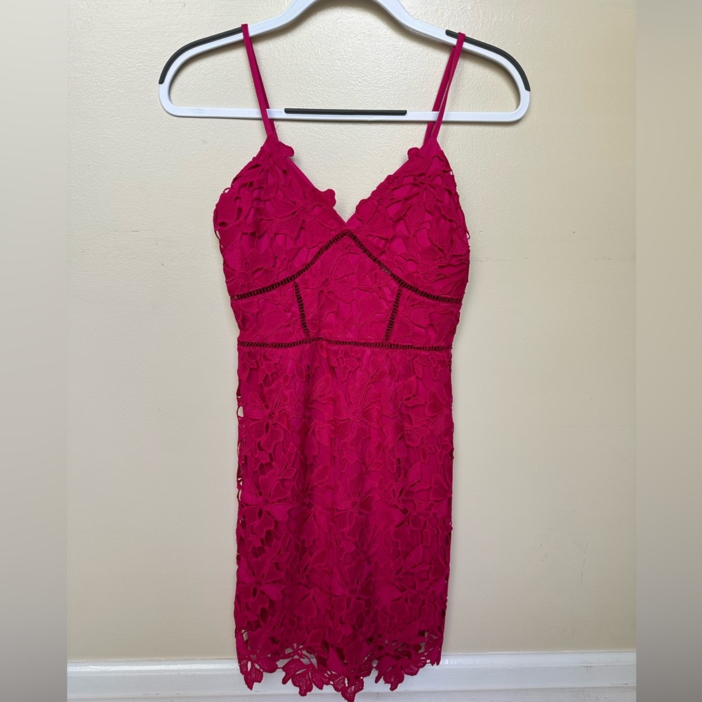 Pink cocktail dress with floral detail